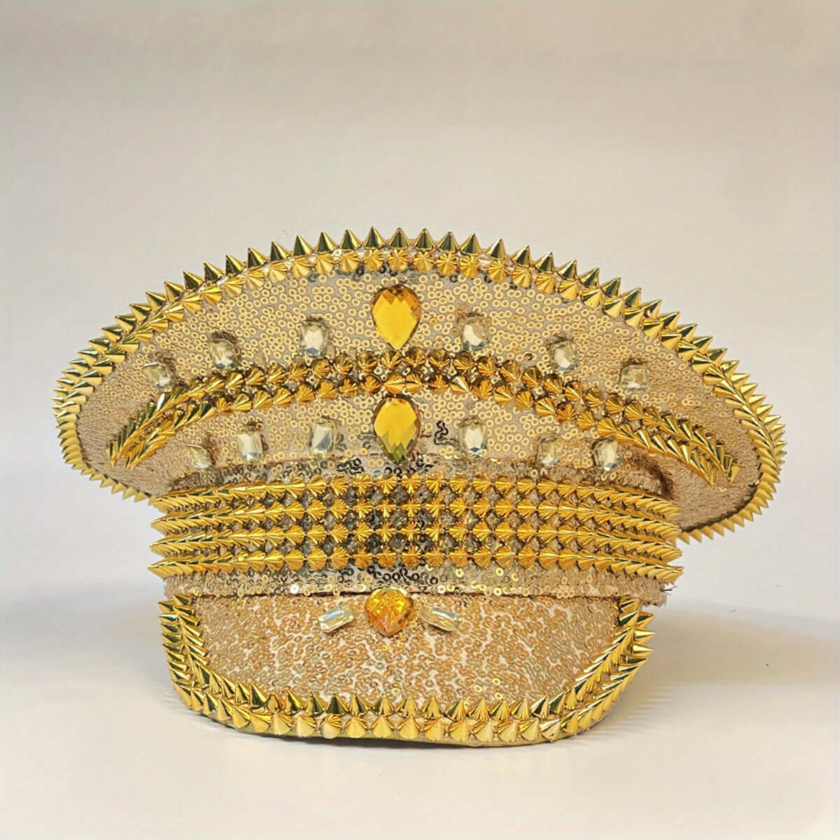 RaveFather Spiked Commander Hat in gold, side view highlighting metallic accents