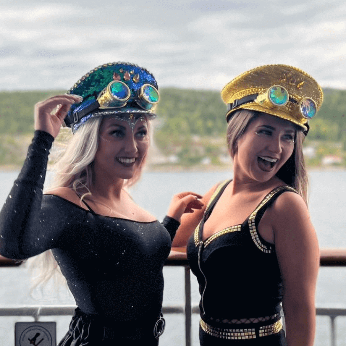 Two women wearing RaveFather Mind-Bending Visuals Piss Goggles with surreal style and vivid colors, enjoying an outdoor event.