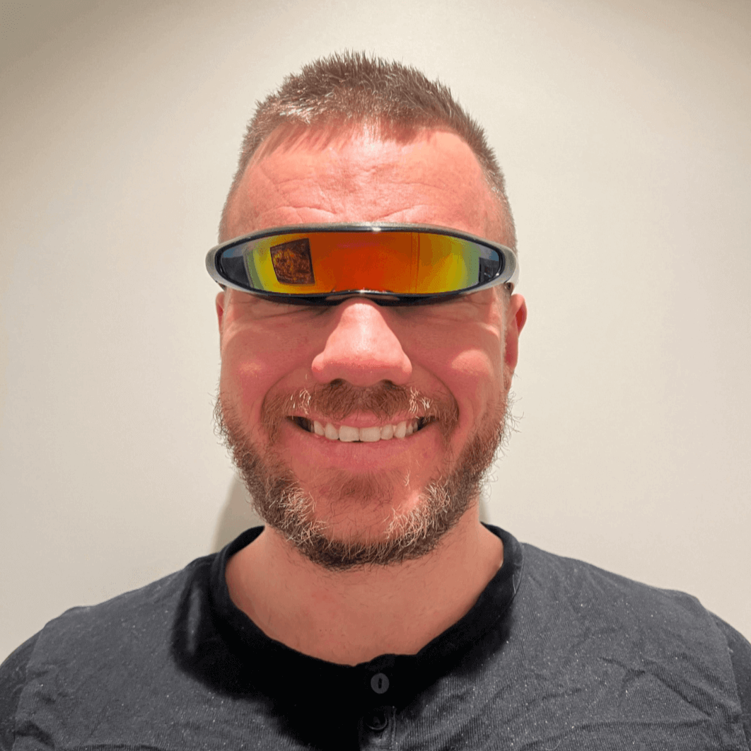 Person wearing RaveFather Cyber Matrix Cyclops Sunglasses with a futuristic design and vibrant lenses.