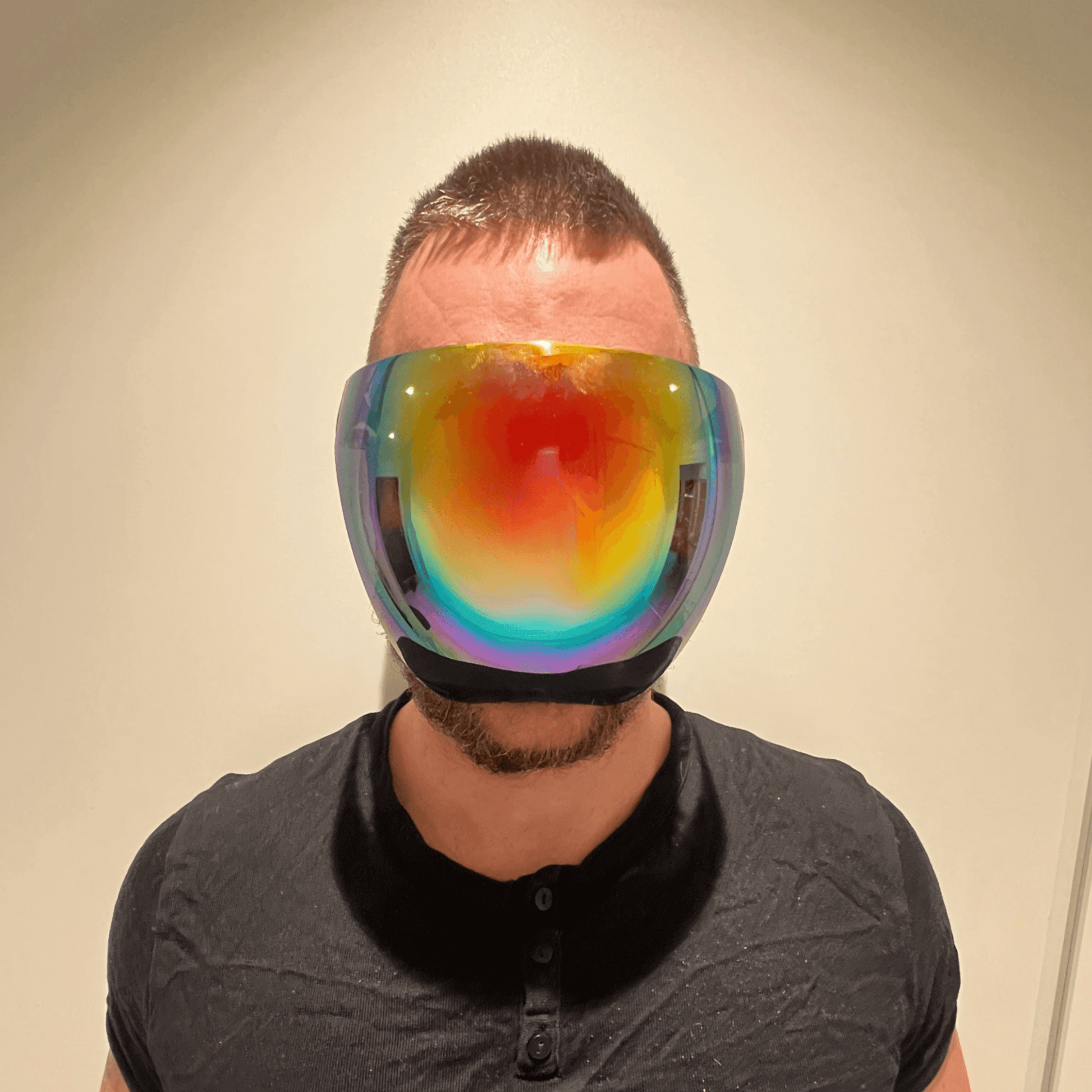 Person wearing RaveFather Rave Mask with a unique, colorful design, ready to elevate their festival experience.