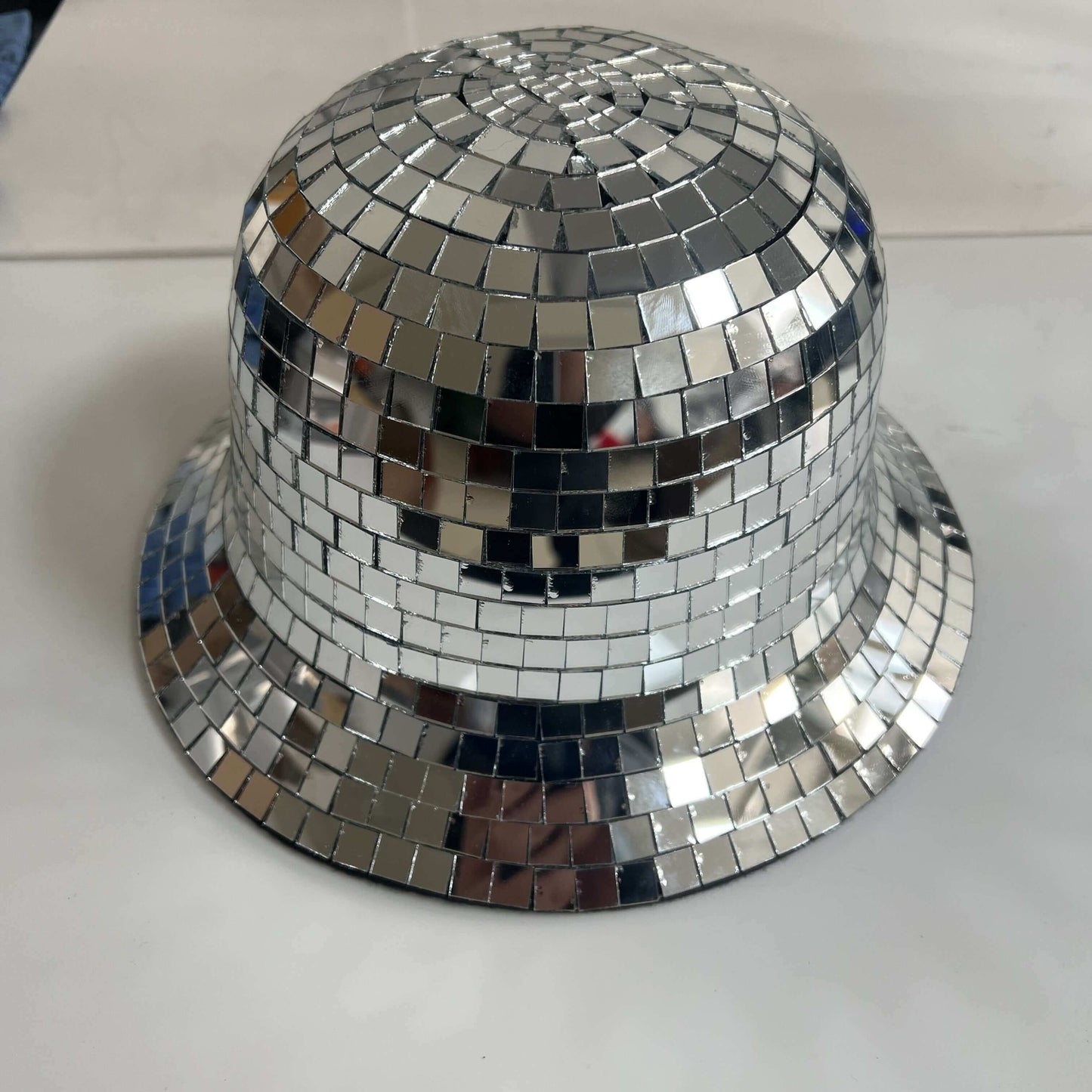 RaveFather Disco Mirage Reflective Bucket Hat with mirror tiles perfect for festivals, raves, and parties, creating a dazzling disco ball effect